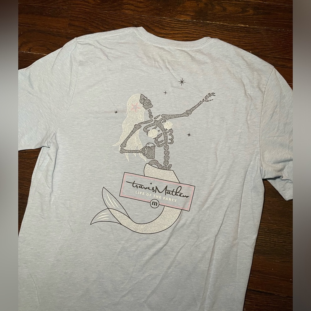 Travis Mathew light blue mermaid tee